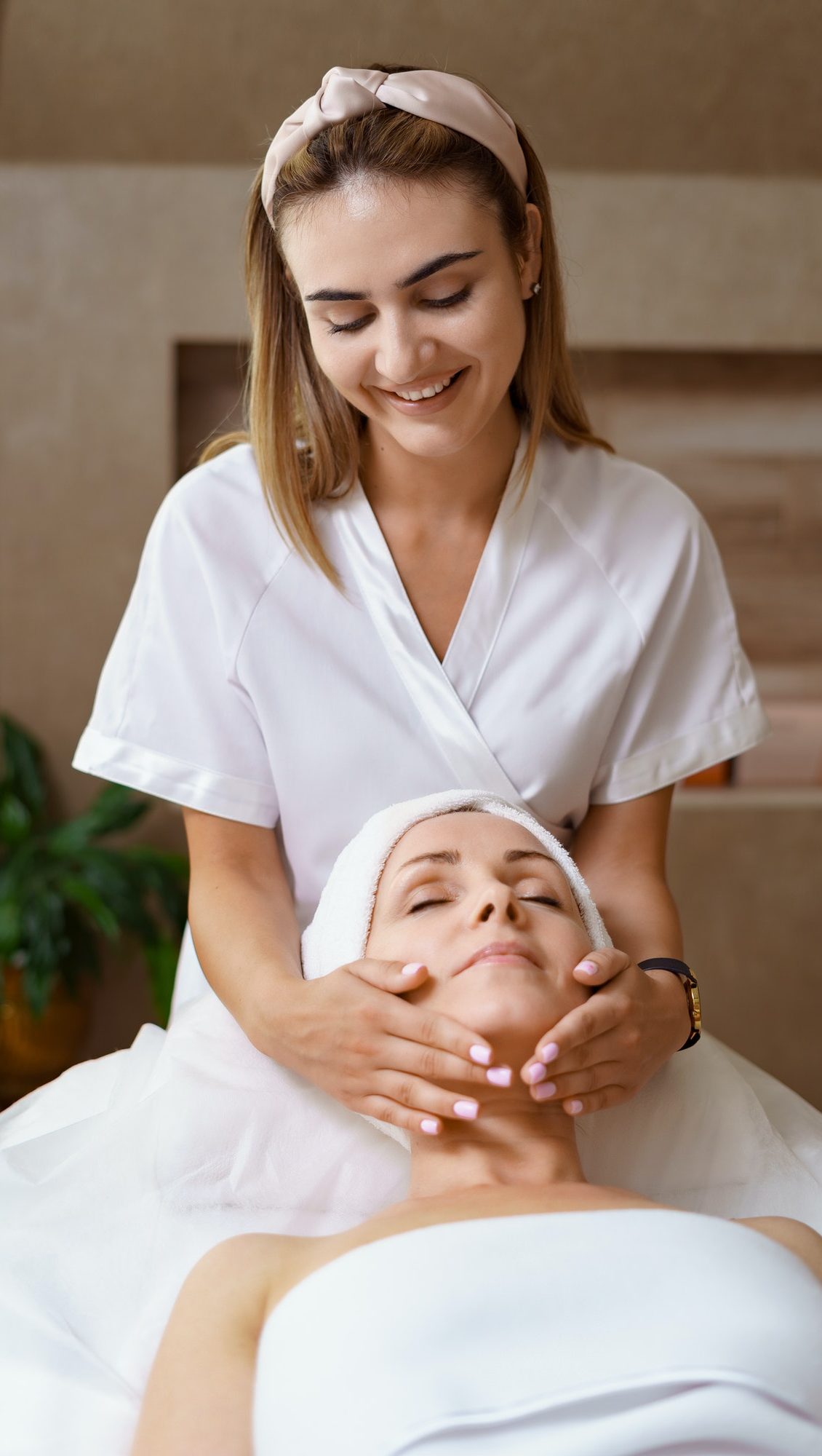 woman-receiving-facial-treatment-from-therapist